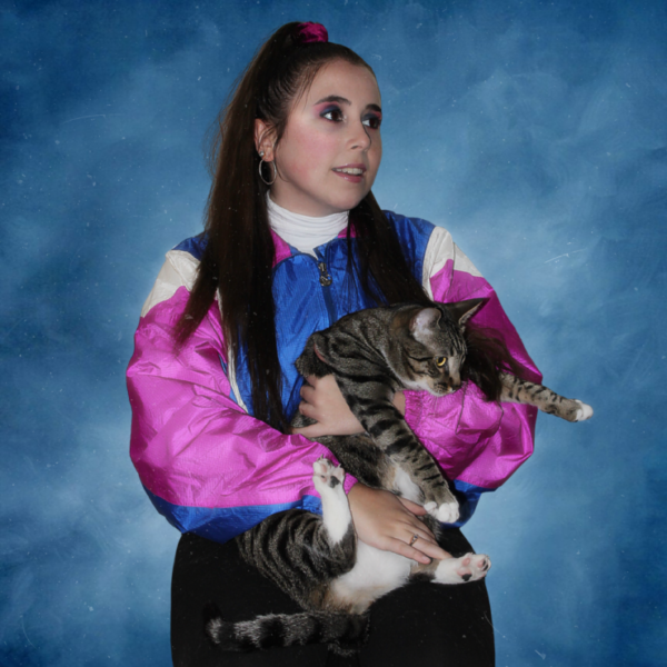 Headshot of Lucie Desvallées holding a cat