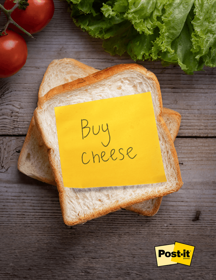 a piece of bread with a yellow orange post it that says buy cheese