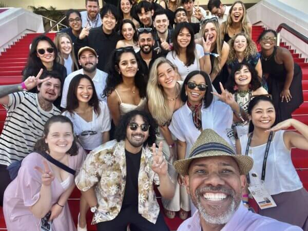 Vann takes a selfie with the members of the creative academy