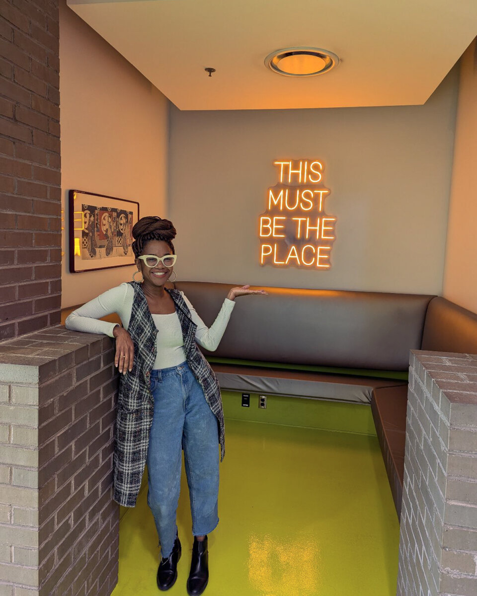 alum shaunda lambert by our this is the place neon sign