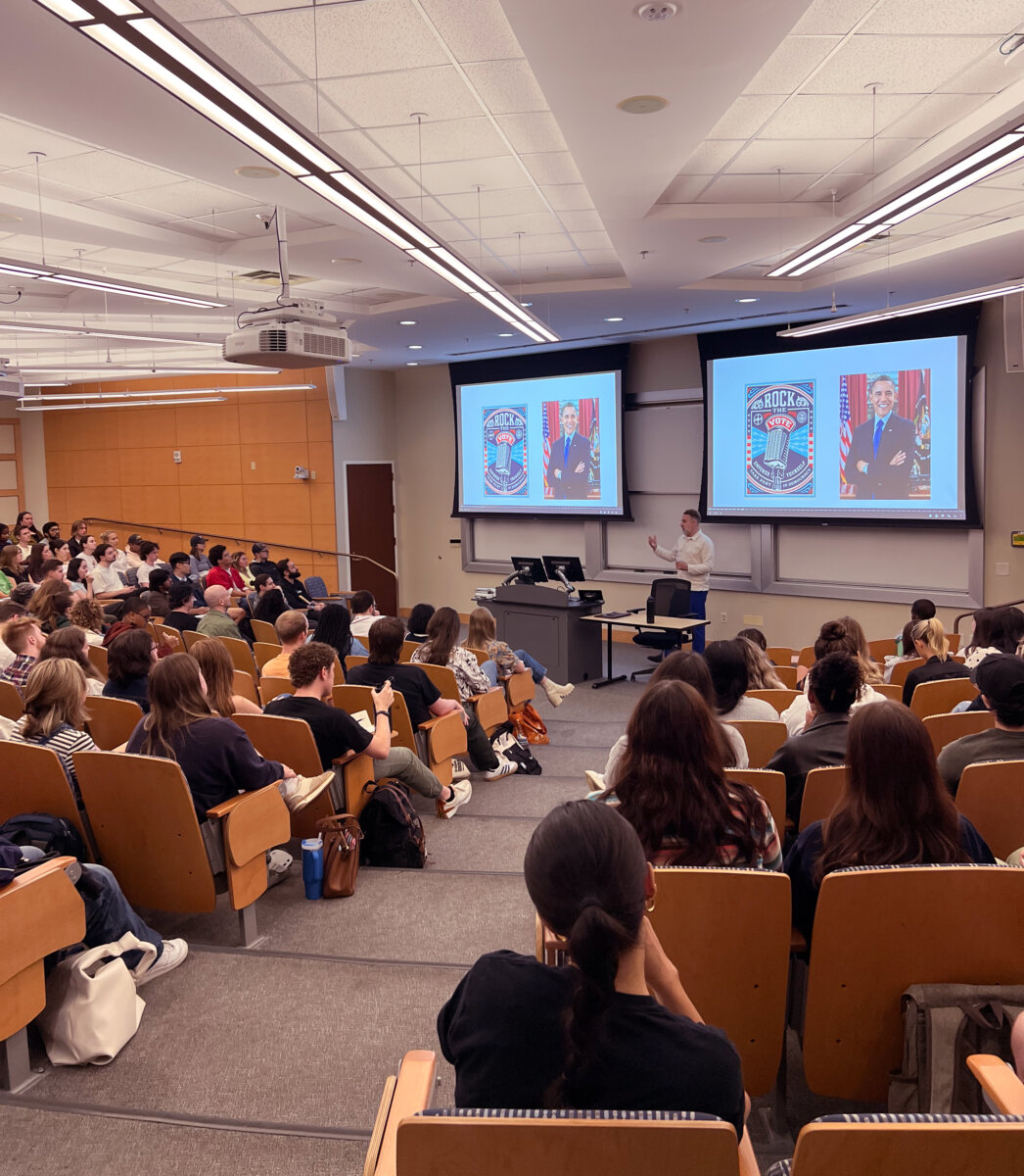 Students listening to Ebenzer during forum