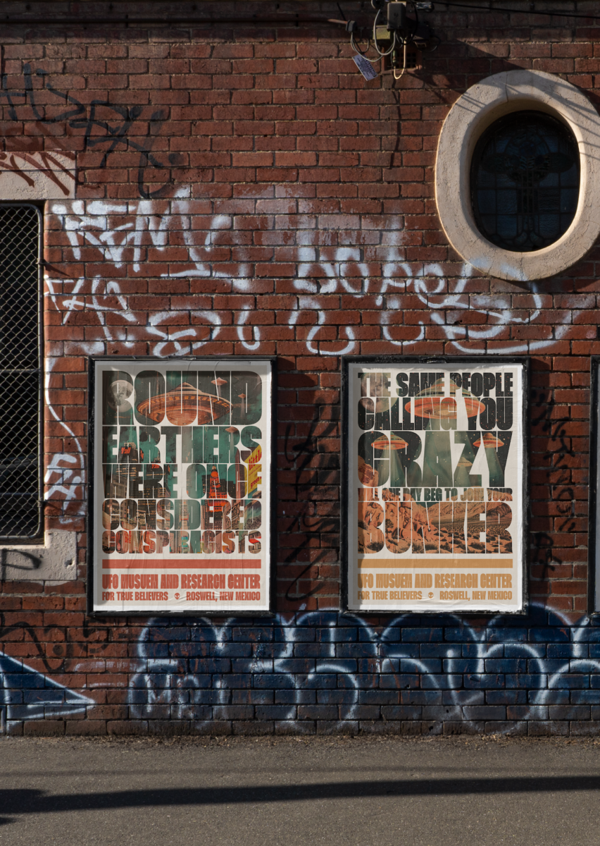 u f o poster mockups on brick wall