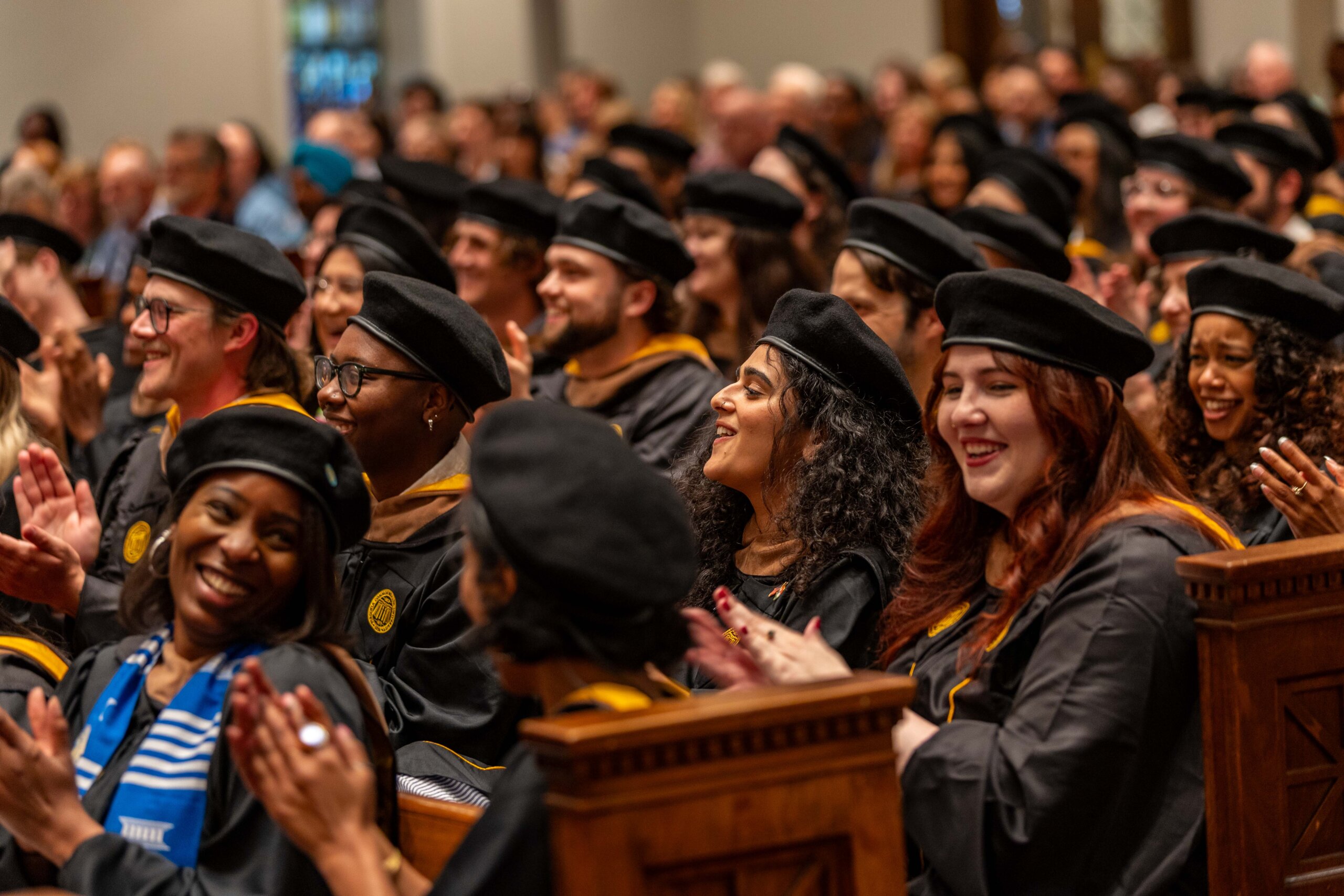 students sitting during ceremony