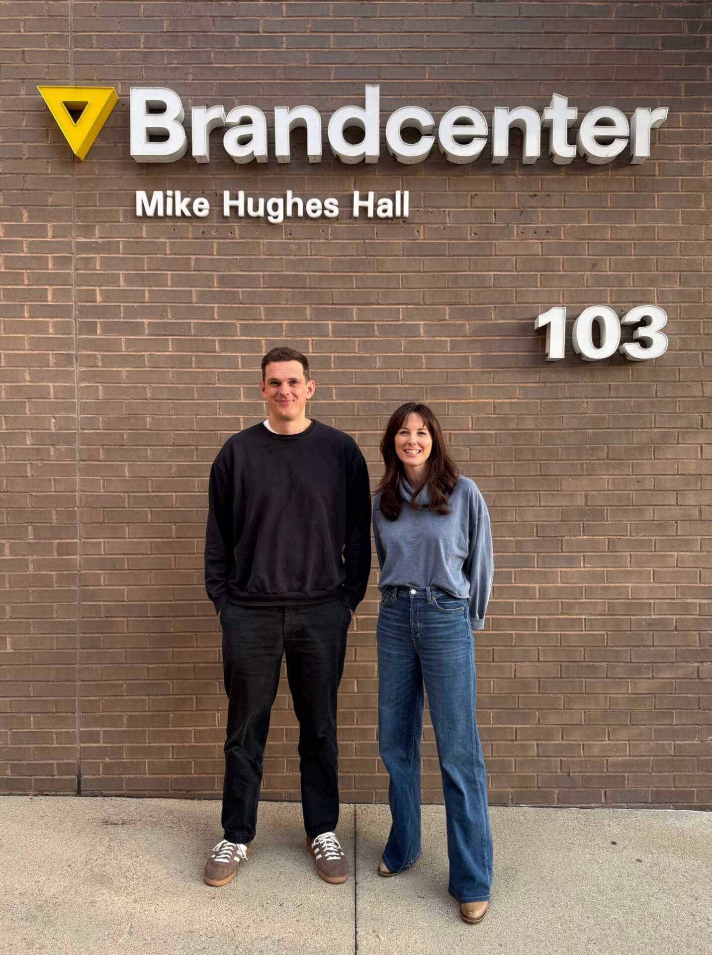 emily and tristan in front of brandcenter