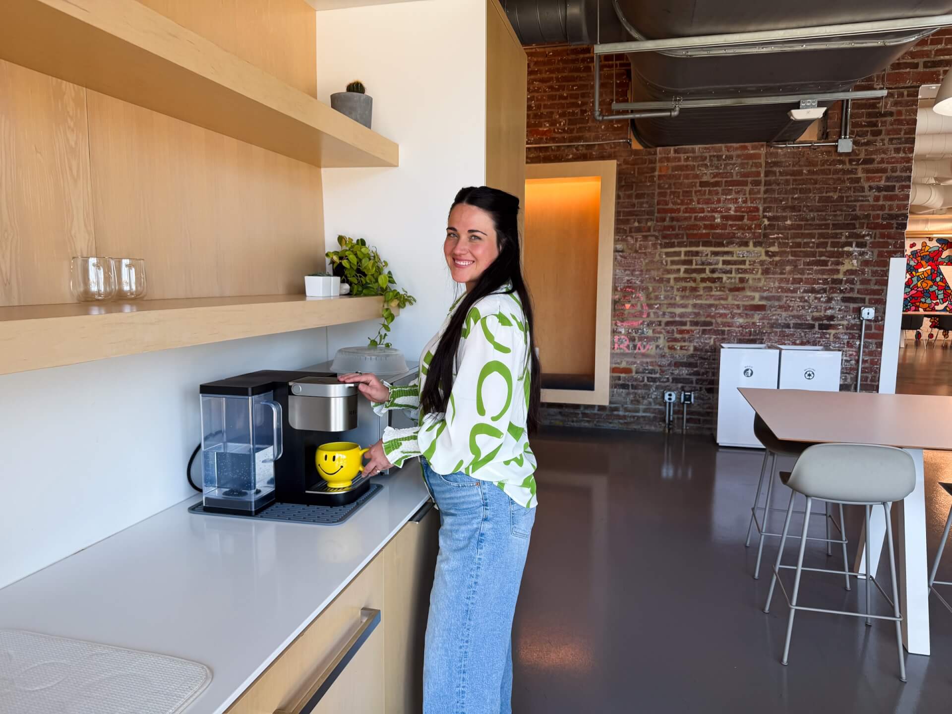 marissa price in student basement kitchen at brandcenter